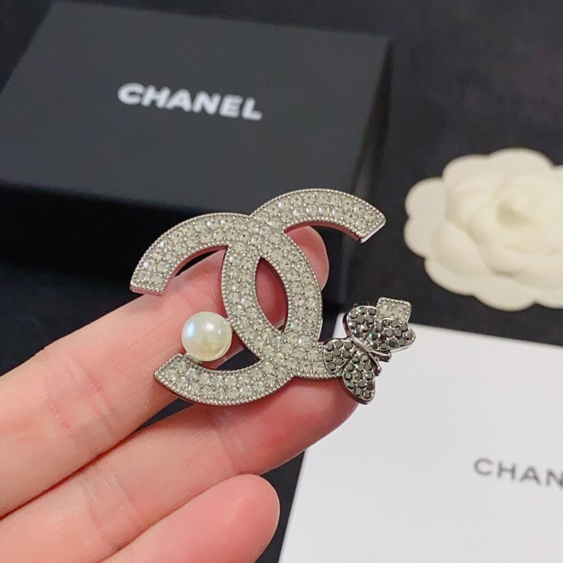 Ch**el brooches